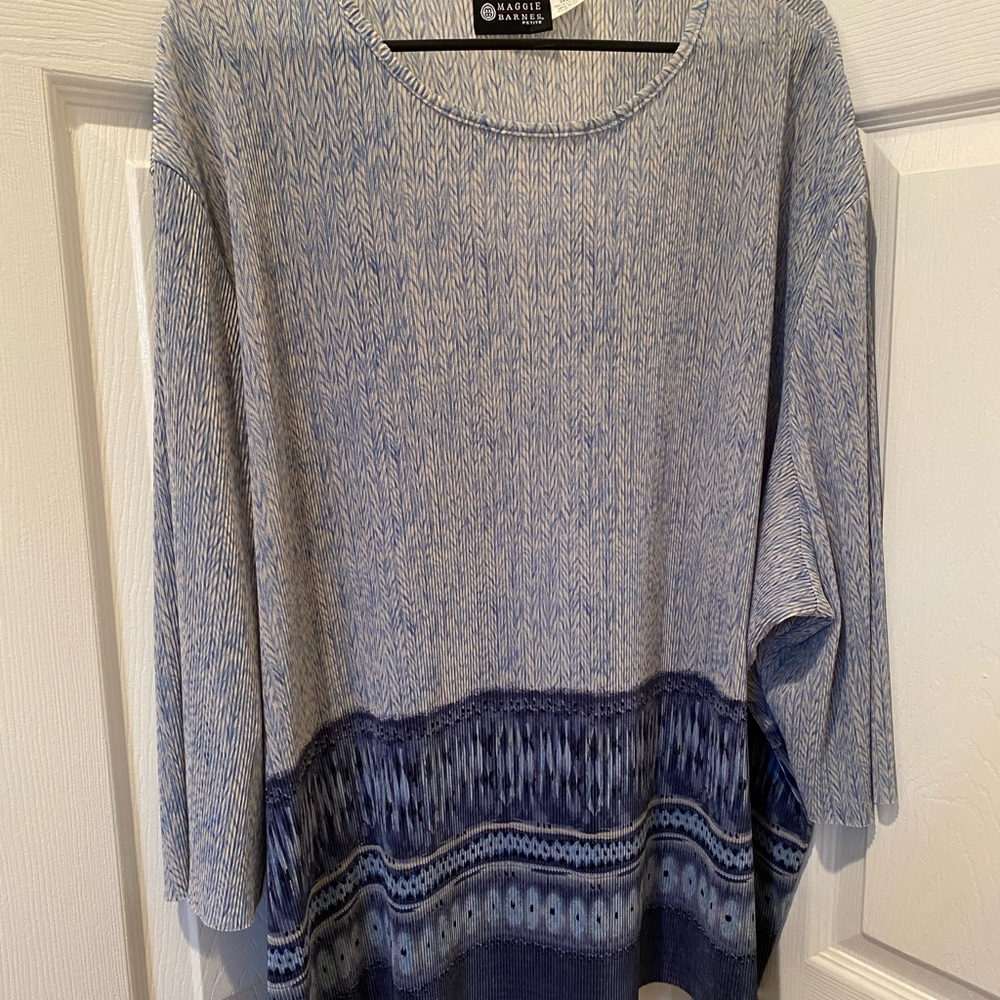 Maggie Barnes 3XWP women’s shirt in a variegated blue color.